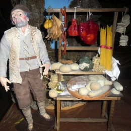 fruttivendolo-pastore-vestito-banco