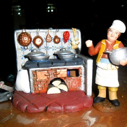 cucina-con-fuoco-e-cuoco